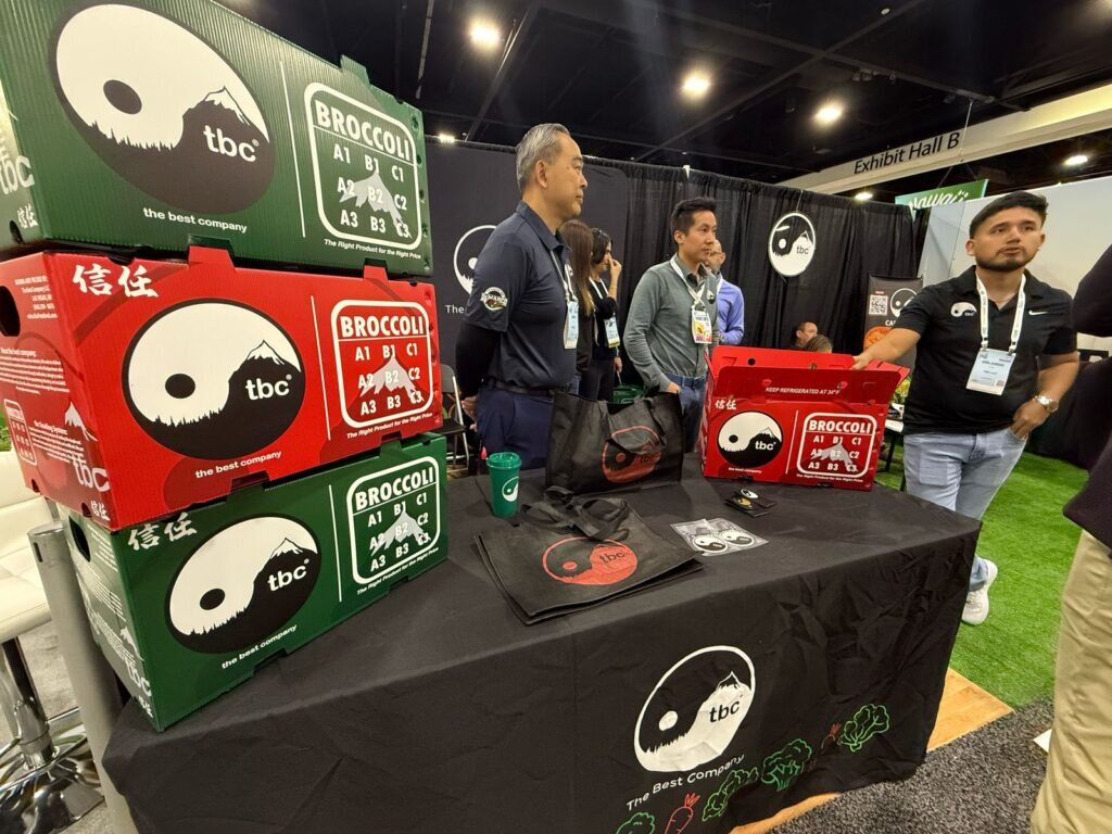 TBC green broccoli carton shown at a produce trade show